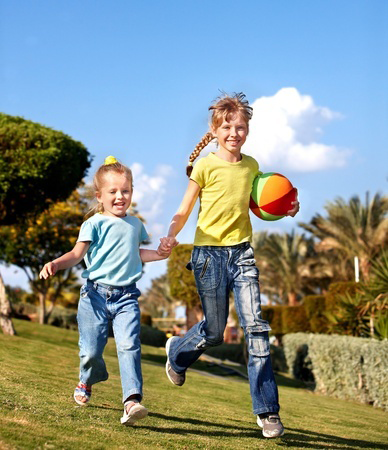 Children running with ball in park. Outdoor. (children, playing, playground) @Gennadiy Poznyakov